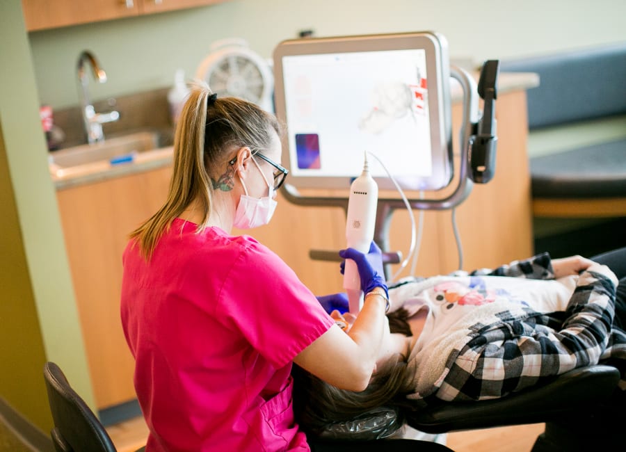 North Seattle Orthodontics patient having an iTero intraoral scan done.